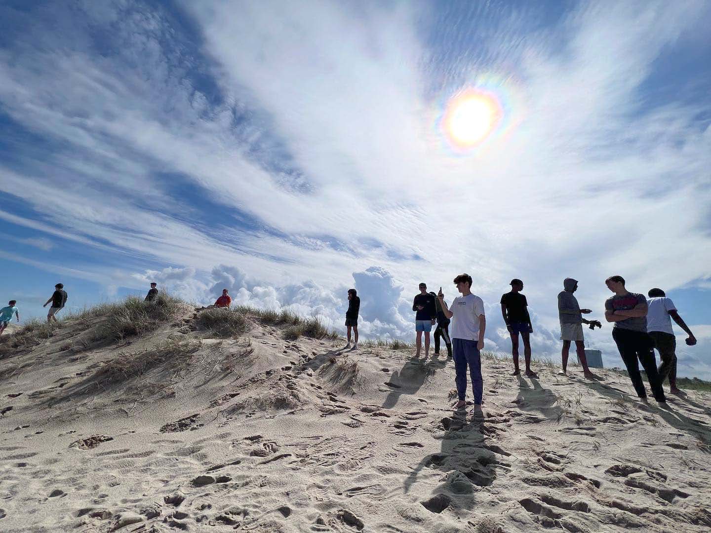 A group of teens on the beach in Connecticut.